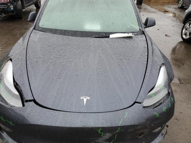 Photo 11 from auction – 2023 TESLA MODEL 3 with VIN 5YJ3E1EC6PF407338