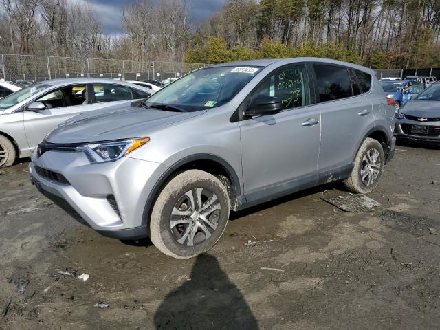 TOYOTA RAV4 LE 2018 with VIN 2T3BFREV8JW792122 - Photo from auction