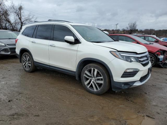 Photo 4 from auction – 2018 HONDA PILOT ELIT with VIN 5FNYF6H04JB013488