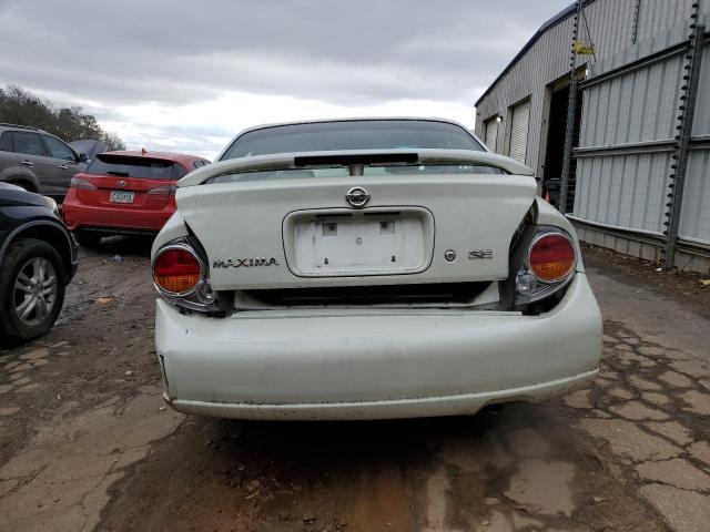 Photo 6 from auction – 2002 NISSAN MAXIMA GLE with VIN JN1DA31D52T414719