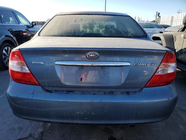 Photo 6 from auction – 2002 TOYOTA CAMRY LE with VIN JTDBE30K120047974