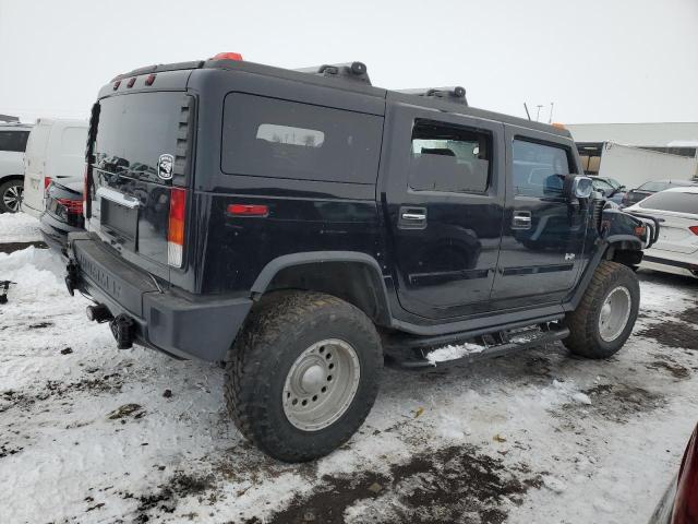 Photo 3 from auction – 2003 HUMMER H2 with VIN 5GRGN23U73H102992