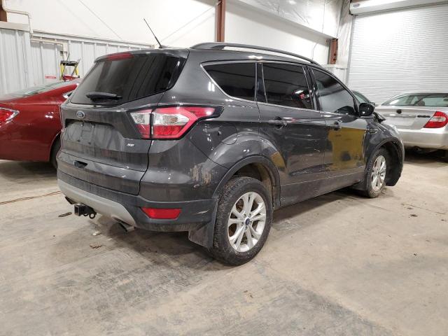Photo 3 from auction – 2018 FORD ESCAPE SE with VIN 1FMCU9GD7JUD34840