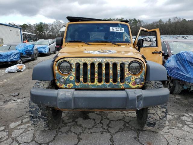Photo 5 from auction – 2014 JEEP WRANGLER U with VIN 1C4BJWDG0EL203492