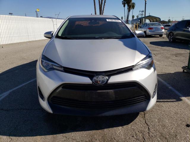 Photo 5 from auction – 2017 TOYOTA COROLLA with VIN 5YFBURHE3HP585255