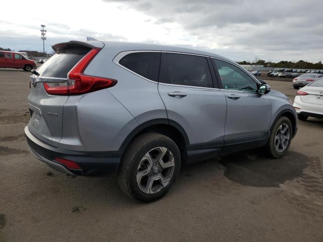 Photo 3 from auction – 2018 HONDA CR-V with VIN 7FARW2H80JE084176