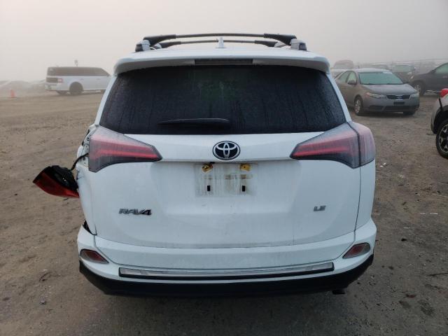Photo 6 from auction – 2017 TOYOTA RAV4 LE with VIN JTMZFREV3HJ143111