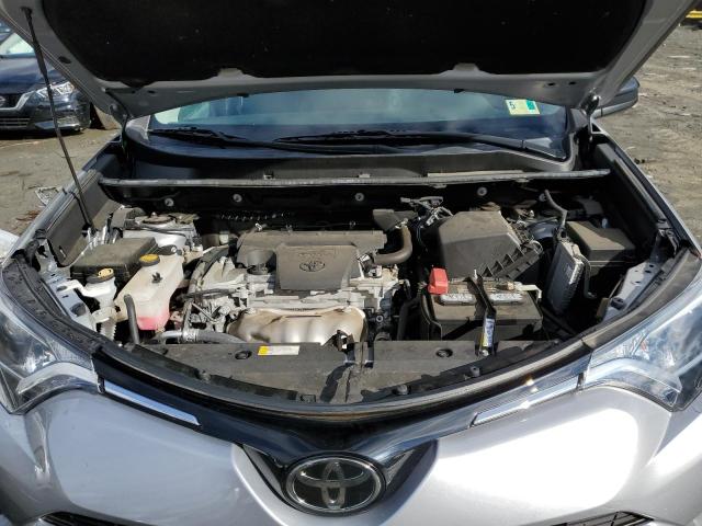 Photo 11 from auction – 2018 TOYOTA RAV4 LE with VIN 2T3BFREV8JW792122