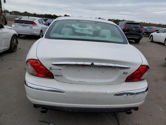 Photo 6 from auction – 2003 JAGUAR X-TYPE 2.5 with VIN SAJEA51D73XD44197