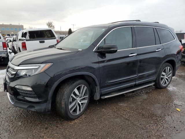 HONDA PILOT ELIT 2017 with VIN 5FNYF6H06HB034532 - Photo from auction