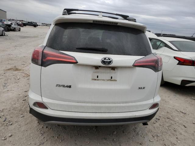 Photo 6 from auction – 2017 TOYOTA RAV4 XLE with VIN 2T3WFREV6HW334705