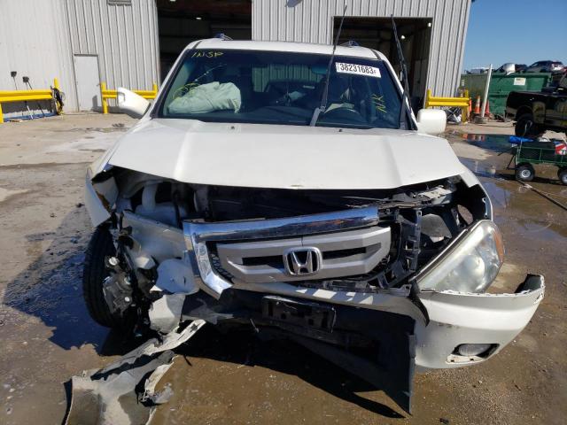 Foto 5 de la subasta – 2011 HONDA PILOT TOUR con VIN 5FNYF3H96BB041792