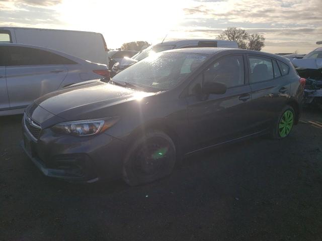 SUBARU IMPREZA 2018 with VIN 4S3GTAA67J3746461 - Photo from auction