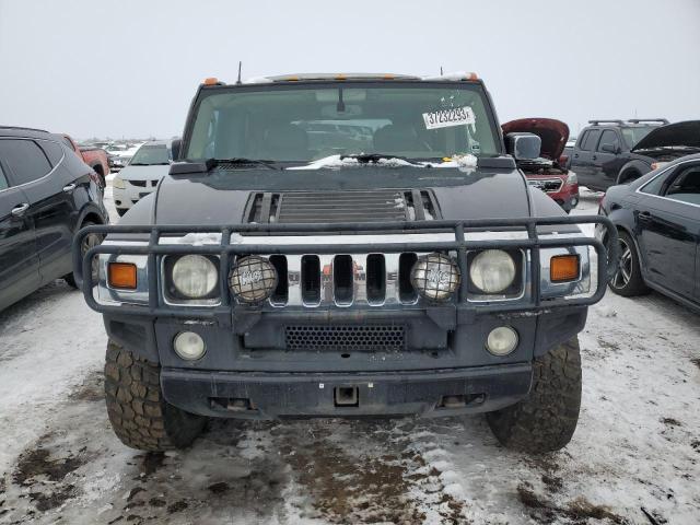 Photo 5 from auction – 2003 HUMMER H2 with VIN 5GRGN23U73H102992