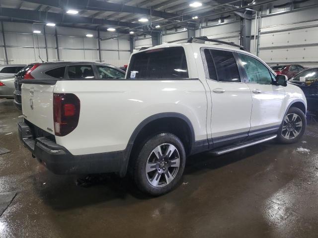 Photo 3 from auction – 2018 HONDA RIDGELINE with VIN 5FPYK3F66JB004574