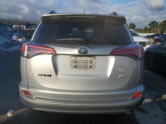 Photo 6 from auction – 2018 TOYOTA RAV4 LE with VIN 2T3ZFREV4JW450584