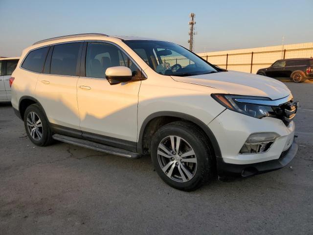 Photo 4 from auction – 2016 HONDA PILOT EXL with VIN 5FNYF6H51GB115349