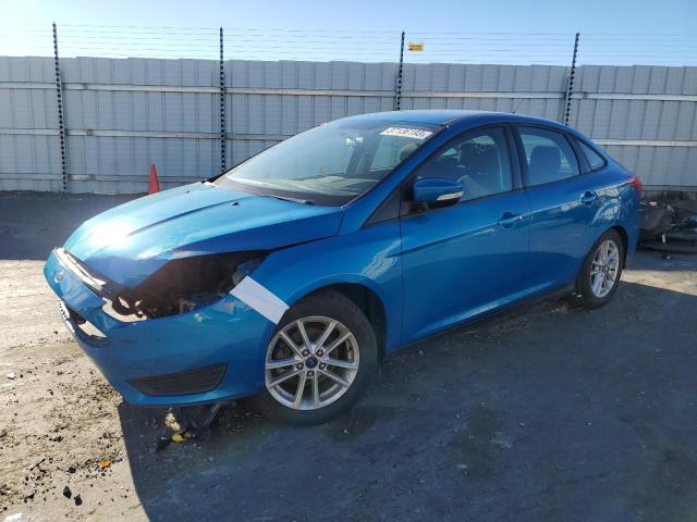 FORD FOCUS SE 2015 with VIN 1FADP3F22FL221989 - Photo from auction