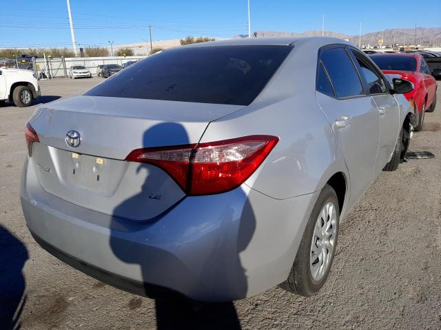 Photo 3 from auction – 2018 TOYOTA COROLLA L with VIN 5YFBURHE2JP763419