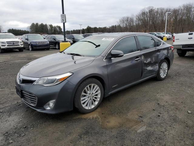 TOYOTA AVALON HYB 2014 with VIN 4T1BD1EB7EU019010 - Photo from auction
