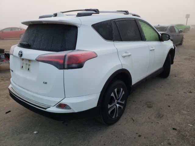 Photo 3 from auction – 2017 TOYOTA RAV4 LE with VIN JTMZFREV3HJ143111