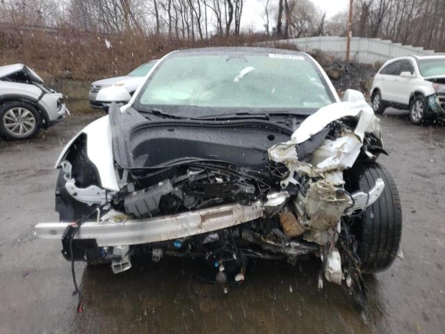 Photo 5 from auction – 2021 TESLA MODEL 3 with VIN 5YJ3E1EB7MF063490