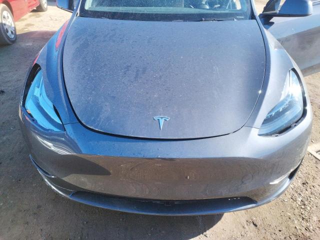 Photo 11 from auction – 2022 TESLA MODEL Y with VIN 7SAYGDEE7NF505572