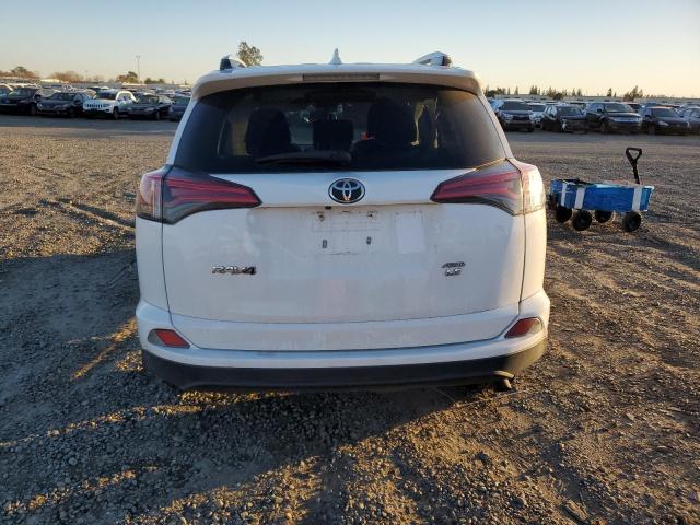 Photo 6 from auction – 2016 TOYOTA RAV4 LE with VIN 2T3BFREV8GW486255