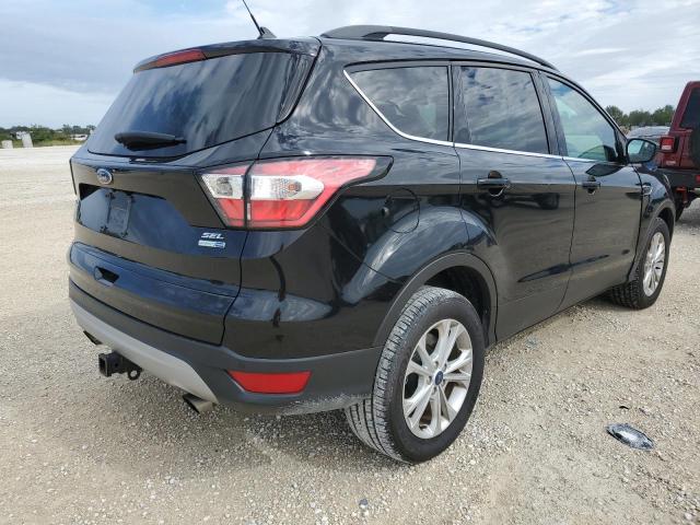 Photo 3 from auction – 2018 FORD ESCAPE SEL with VIN 1FMCU9HD7JUC56462