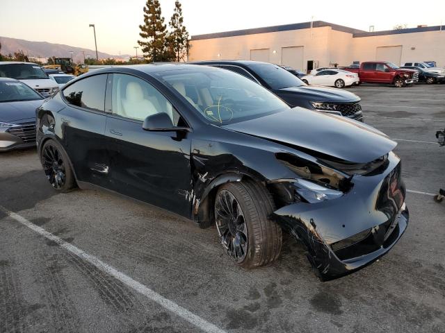 Photo 4 from auction – 2022 TESLA MODEL Y with VIN 7SAYGDEF9NF490002