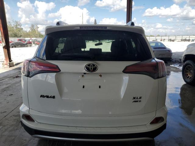 Photo 6 from auction – 2016 TOYOTA RAV4 XLE with VIN JTMRFREVXGJ056899