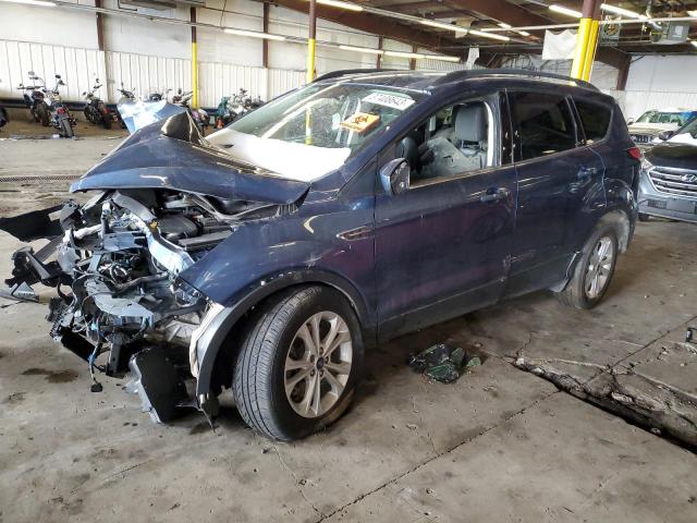 FORD ESCAPE SE 2018 with VIN 1FMCU9GD8JUB25235 - Photo from auction