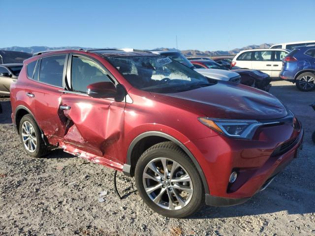 Photo 4 from auction – 2018 TOYOTA RAV4 LIMIT with VIN JTMDFREV7JD237538