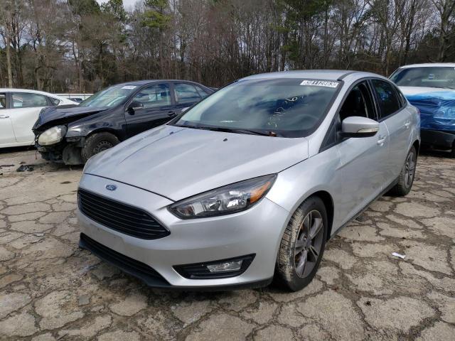 FORD FOCUS SE 2017 with VIN 1FADP3FE8HL293955 - Photo from auction