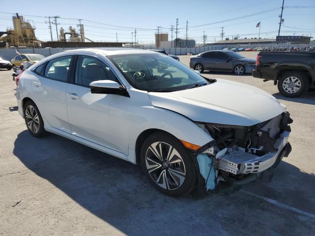 Photo 4 from auction – 2016 HONDA CIVIC EX with VIN 2HGFC1F34GH650739