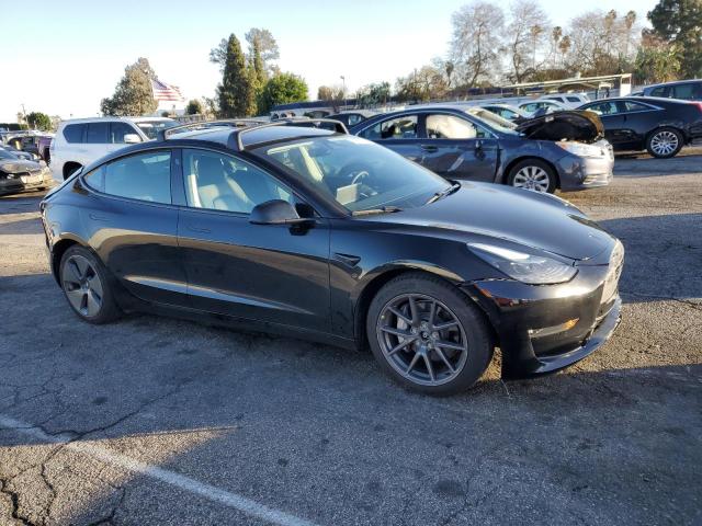 Photo 4 from auction – 2021 TESLA MODEL 3 with VIN 5YJ3E1EB3MF003707