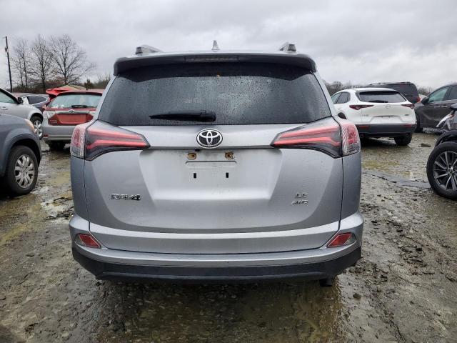 Photo 6 from auction – 2018 TOYOTA RAV4 LE with VIN JTMBFREV8JJ213810