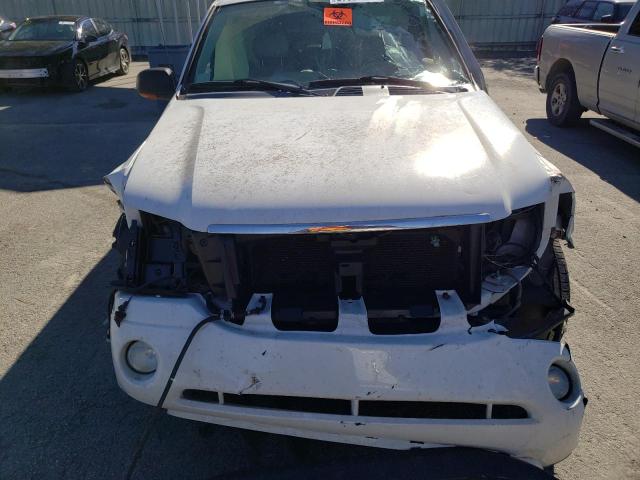 Photo 11 from auction – 2005 GMC ENVOY with VIN 1GKDS13S452290600