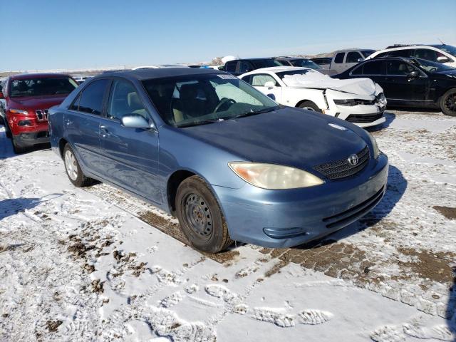 Photo 4 from auction – 2002 TOYOTA CAMRY LE with VIN JTDBE32K220035829
