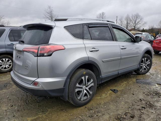 Photo 3 from auction – 2018 TOYOTA RAV4 LE with VIN JTMBFREV8JJ213810