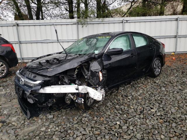 HONDA CIVIC EX 2018 with VIN 2HGFC2F77JH564812 - Photo from auction