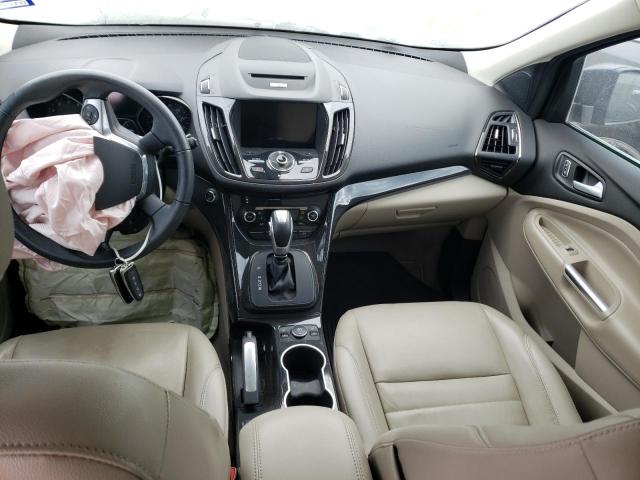 Photo 8 from auction – 2015 FORD ESCAPE TIT with VIN 1FMCU0J97FUA78156
