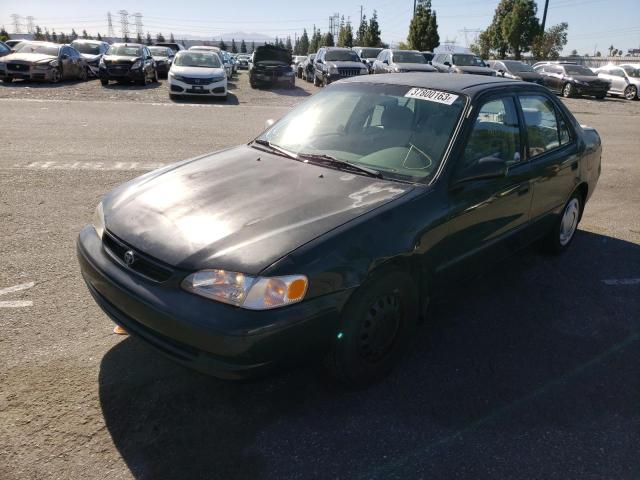 TOYOTA COROLLA 2000 con VIN 1NXBR12E0YZ328211 - Foto de la subasta