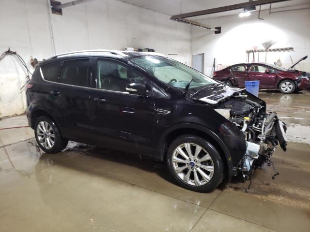 Photo 4 from auction – 2017 FORD ESCAPE TIT with VIN 1FMCU9JD4HUC82280