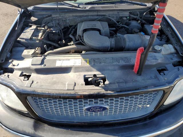 Photo 11 from auction – 2001 FORD F150 SUPER with VIN 1FTRW08L11KB74931