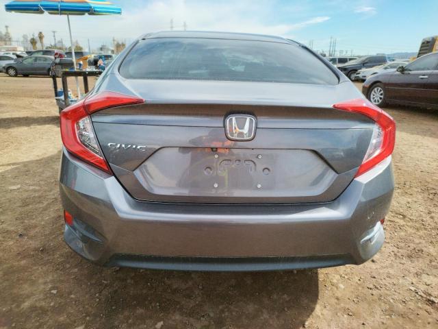 Photo 6 from auction – 2017 HONDA CIVIC LX with VIN 19XFC2F56HE047732
