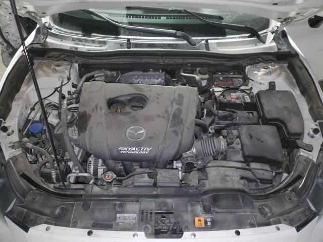 Photo 11 from auction – 2015 MAZDA 3 TOURING with VIN 3MZBM1L76FM224906