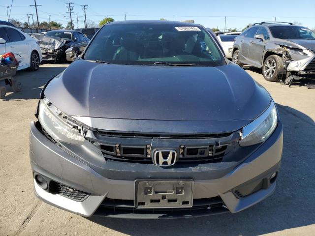 Photo 5 from auction – 2017 HONDA CIVIC TOUR with VIN 2HGFC3B90HH354589