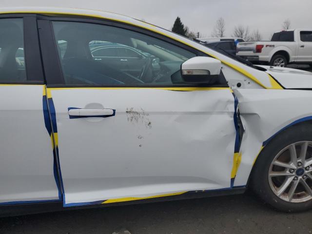 Photo 10 from auction – 2016 FORD FOCUS SE with VIN 1FADP3F26GL329310