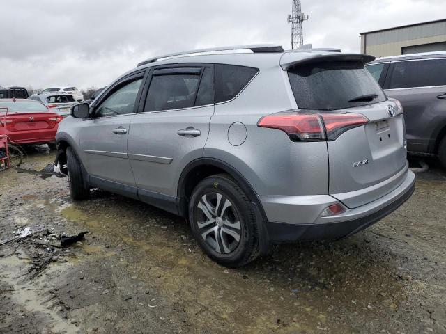 Photo 2 from auction – 2018 TOYOTA RAV4 LE with VIN JTMBFREV8JJ213810